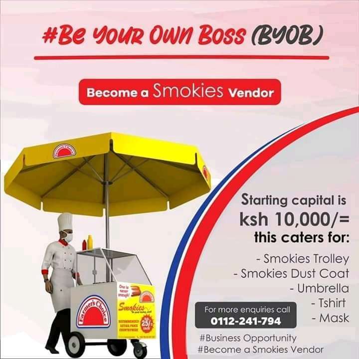 an image of a smokie trolley, umbrella and smokie seller