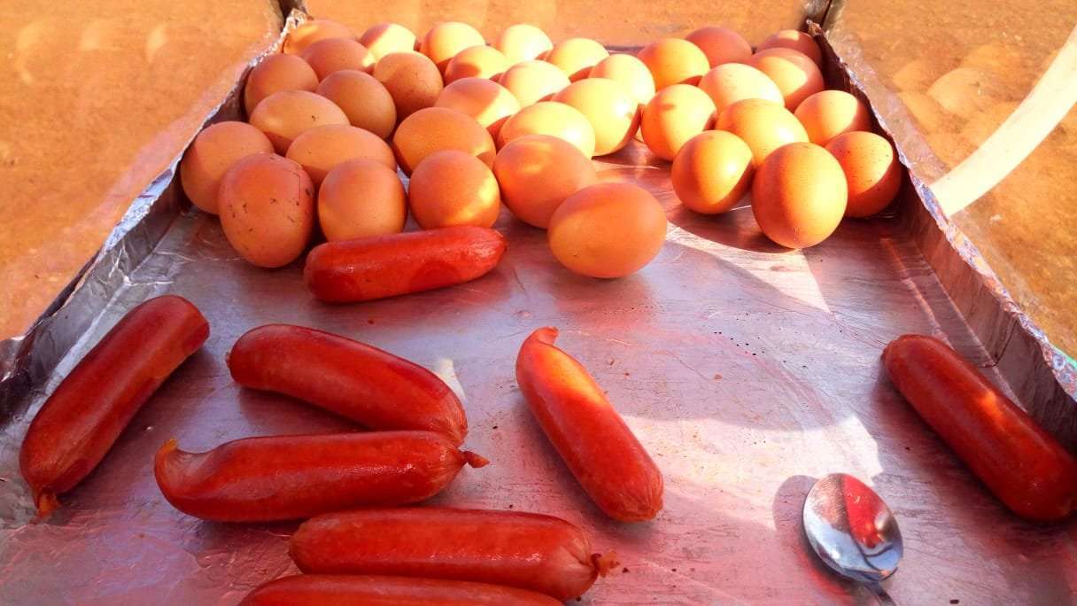 an image of eggs and smokies in a trolley
